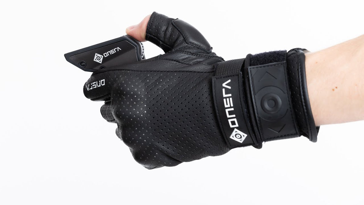 ONSRA E-Skate Gloves: black glove with palm slider and double wrist strap holding a remote, video preview