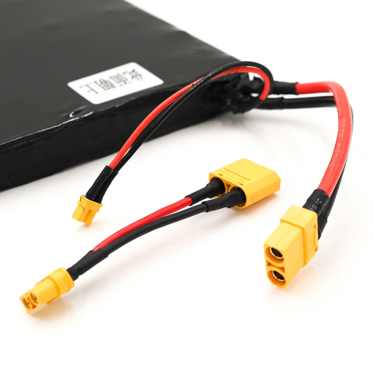 ONSRA electric skateboard battery pack with red power cables and yellow XT connectors