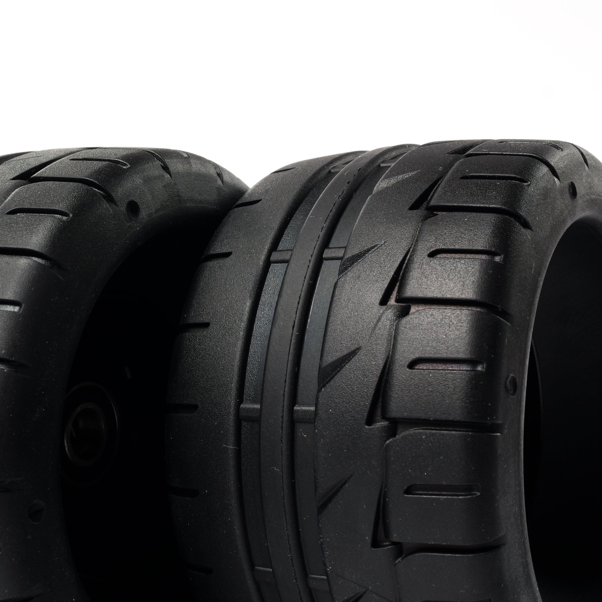 Onsra 115mm x 65mm 70A black rubber electric skateboard wheel with street tread pattern