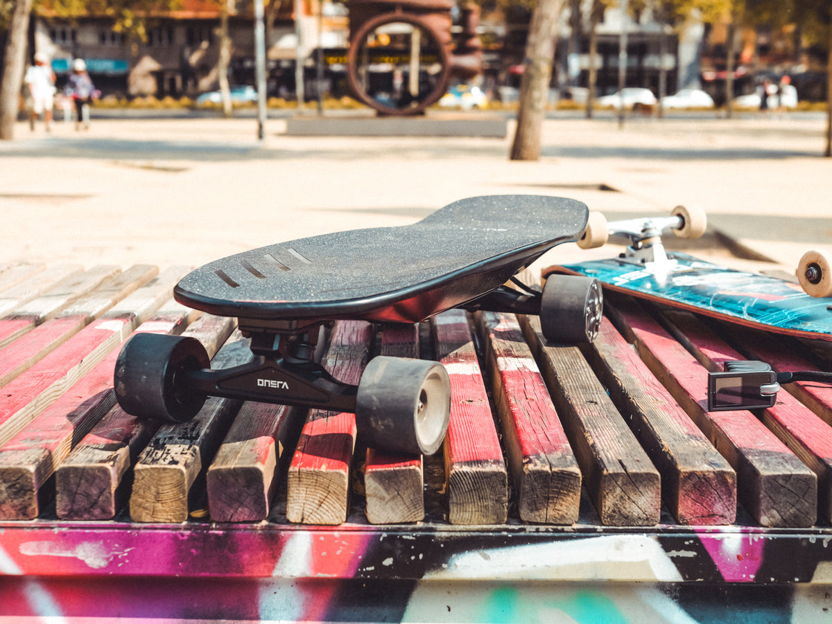 ONSRA ZENO on a painted bench