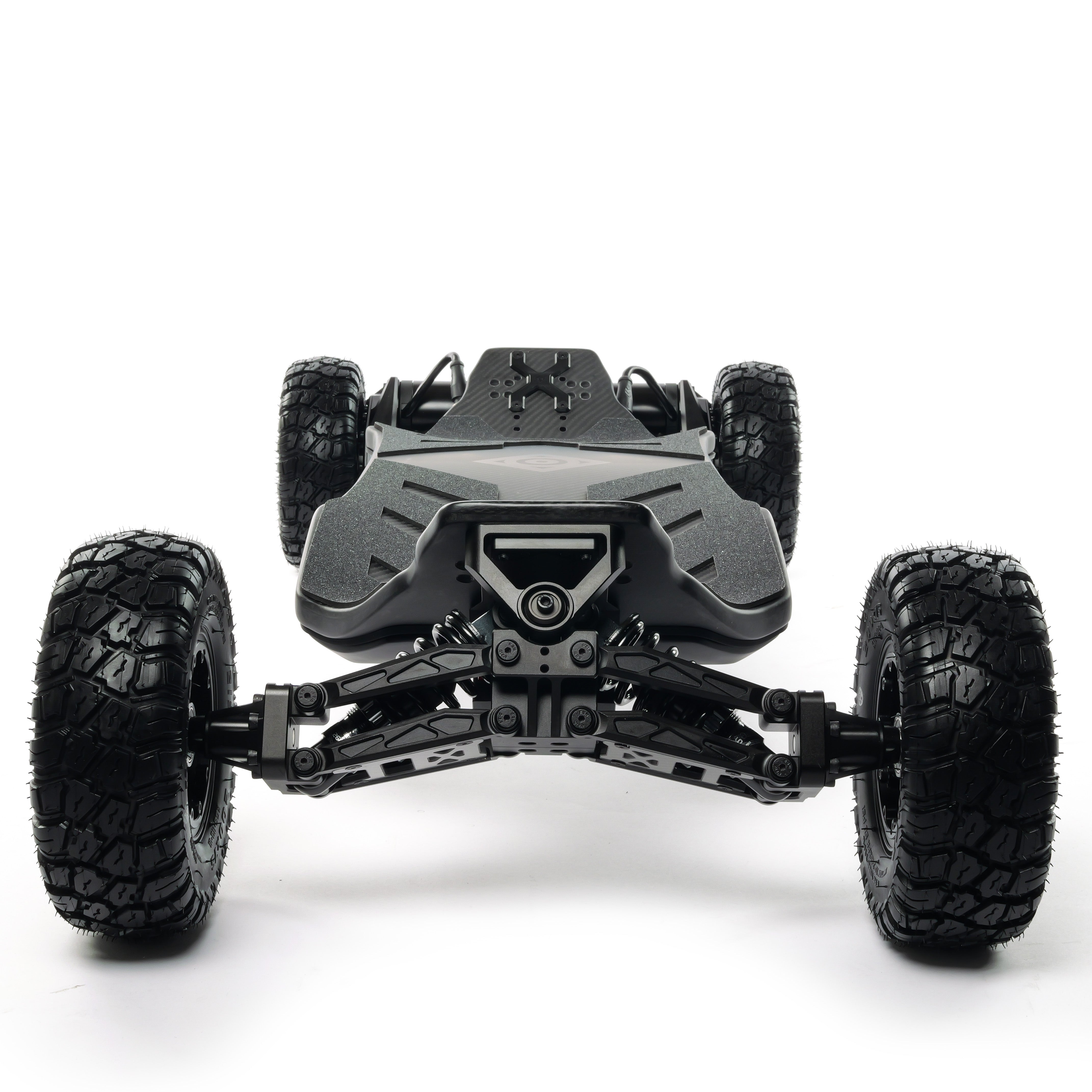 VELAR off-road electric longboard with full suspension, CNC-machined suspension trucks, and large all-terrain tires for a smooth and controlled ride over rough terrain.
