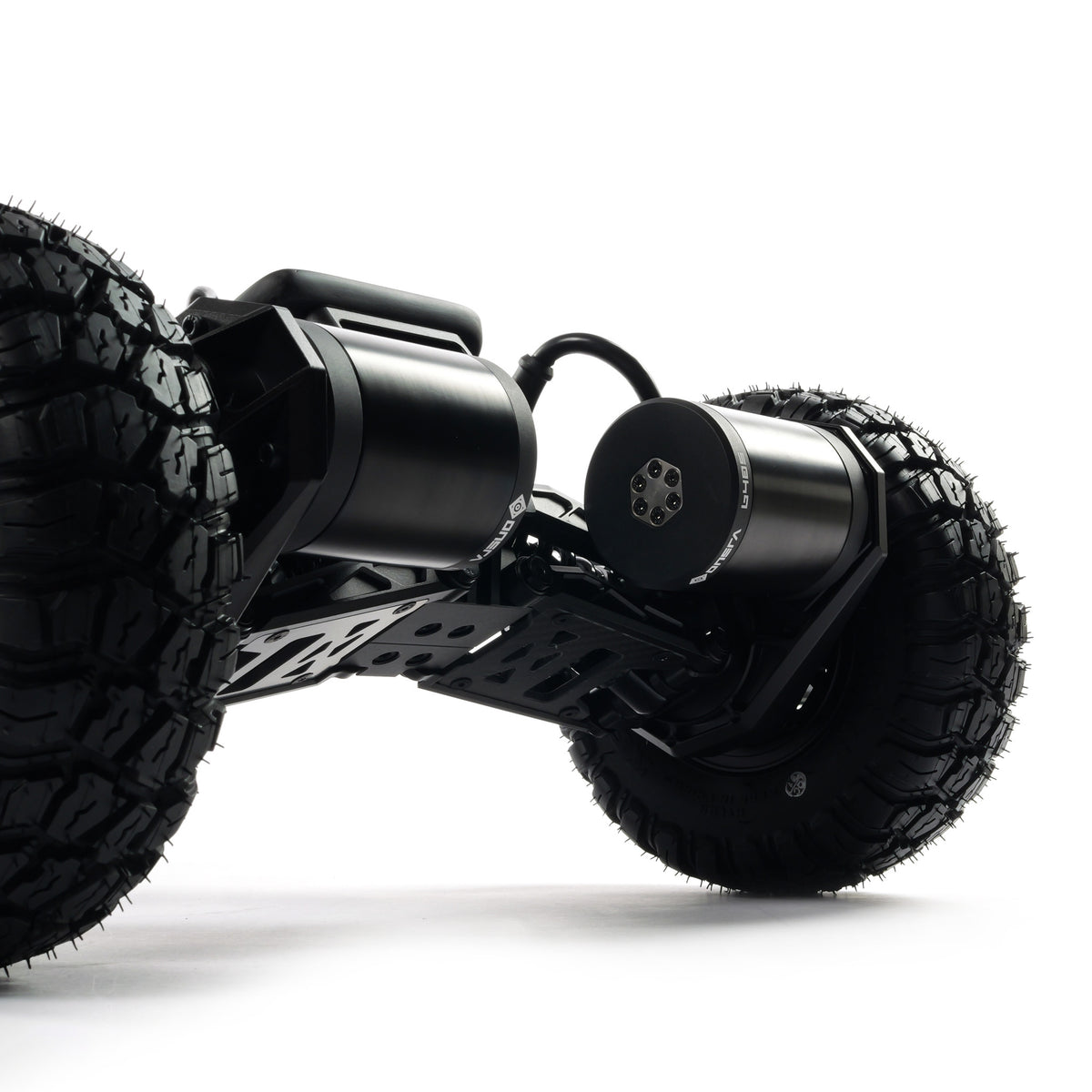 VELAR off-road electric longboard with full suspension, CNC-machined suspension trucks, and large all-terrain tires for a smooth and controlled ride over rough terrain.